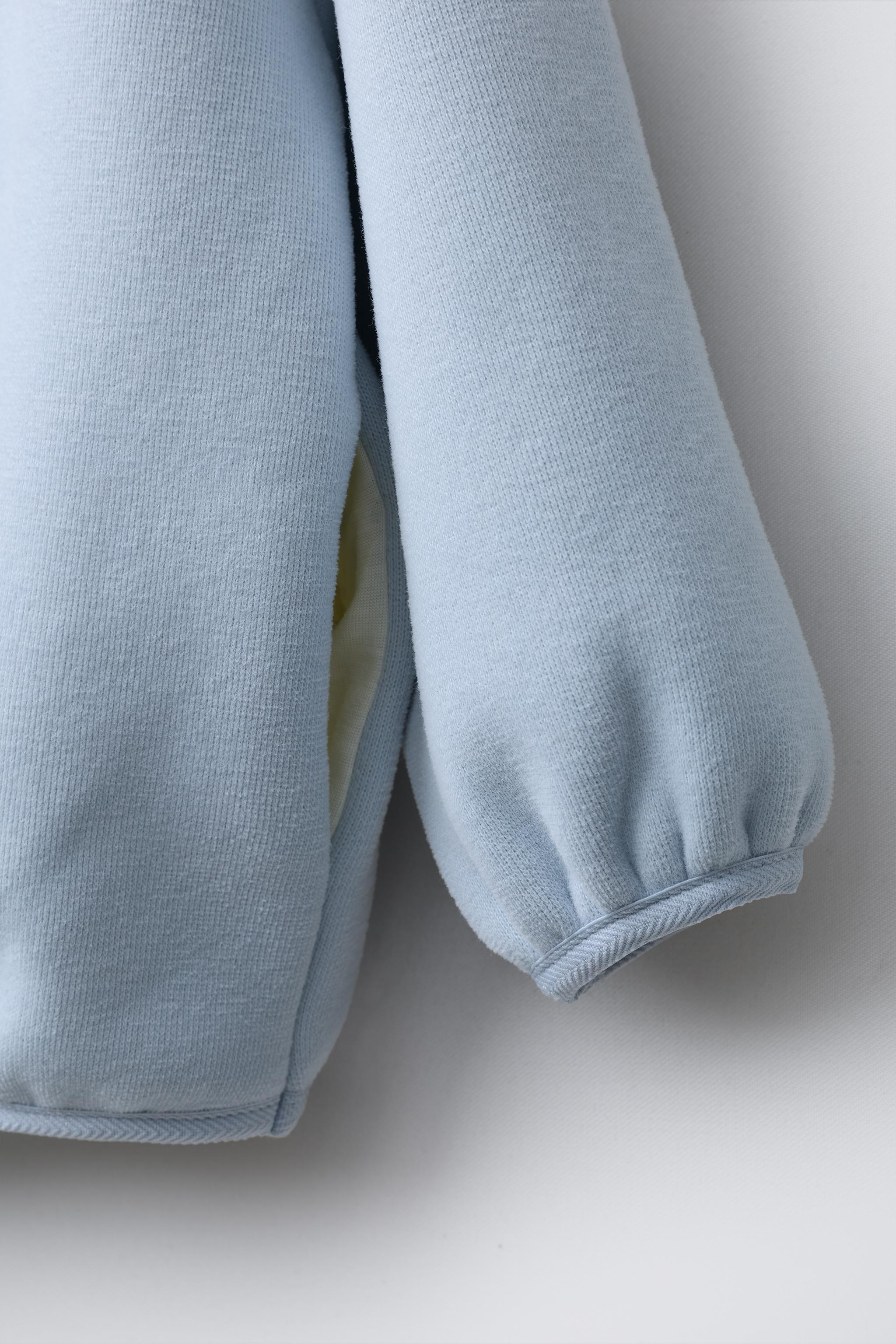 SWEAT À CAPUCHE EN POLAIRE AVEC LOGO